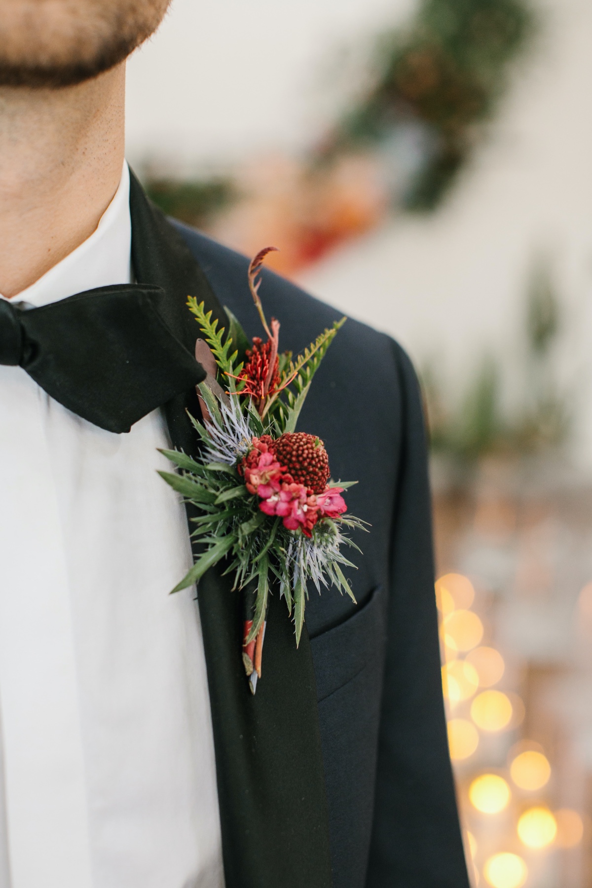 succulent boutonniÃ¨re in black tie tux from The Black Tux
