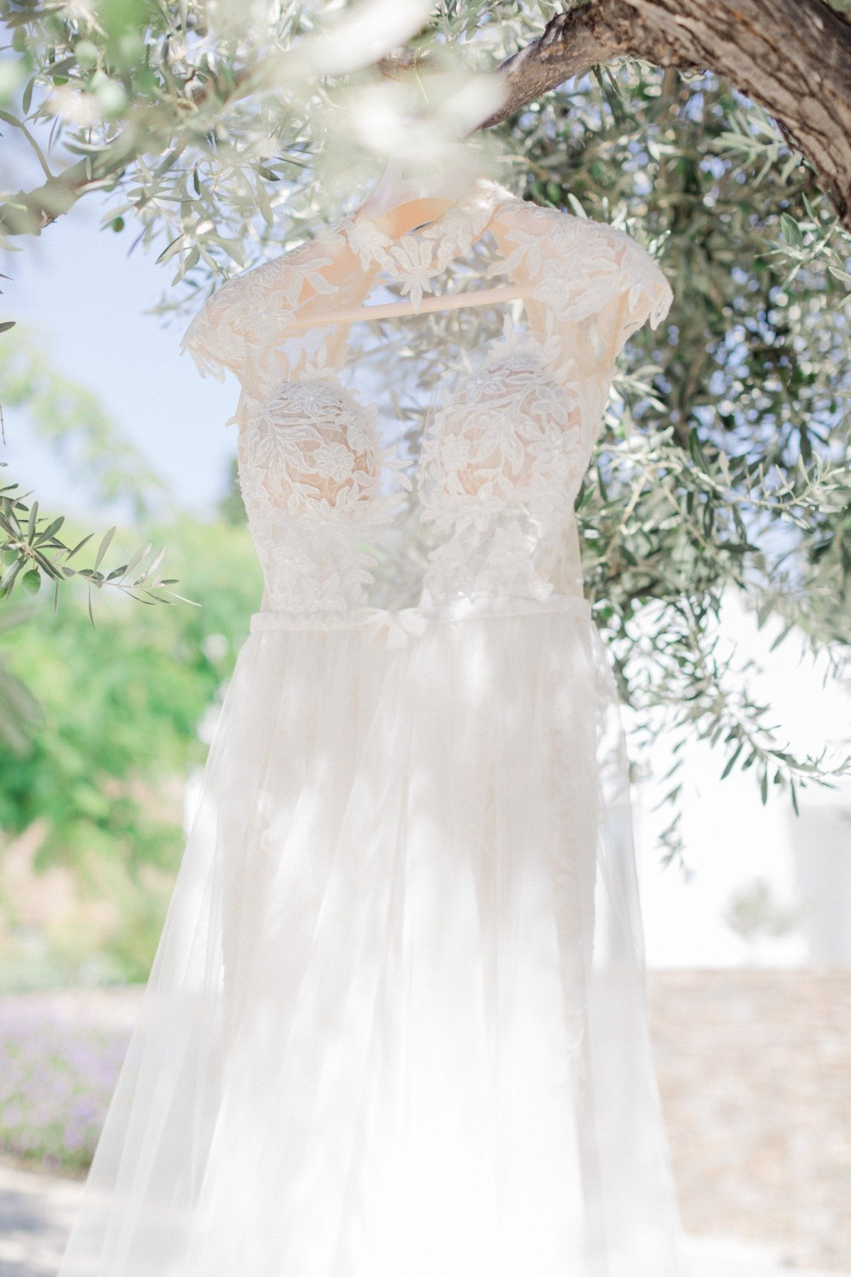 white wedding dress with cap sleeves