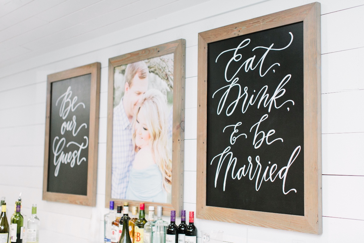 decorate the bar with engagement photo and cute signs