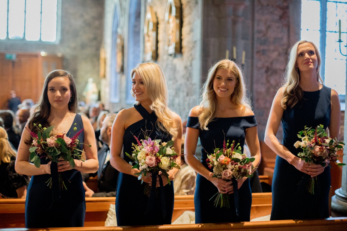 Bridesmaids in Jenny Yoo Navy Blue Bridesmaid Dresses