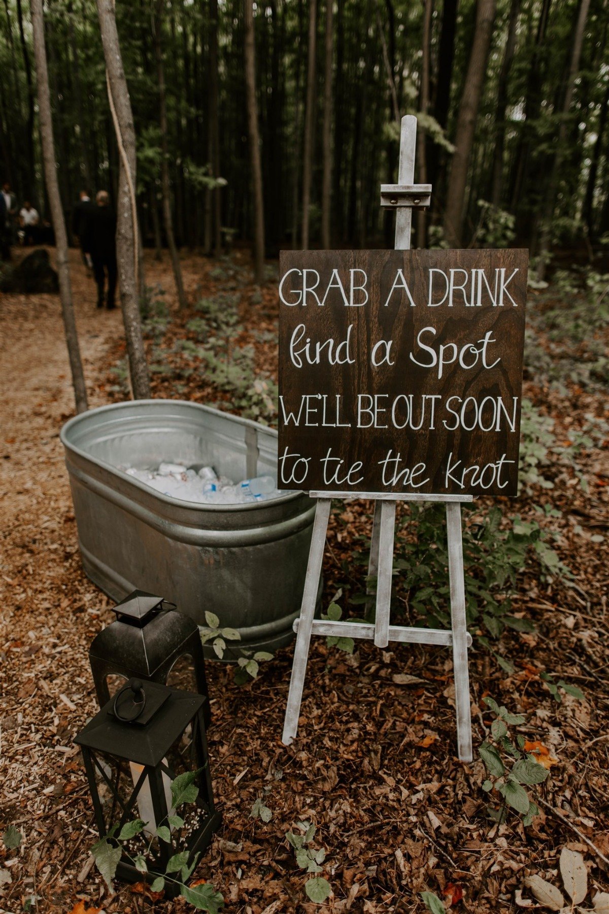 Grab a drink, find a spot we'll be out soon to tie the knot sign