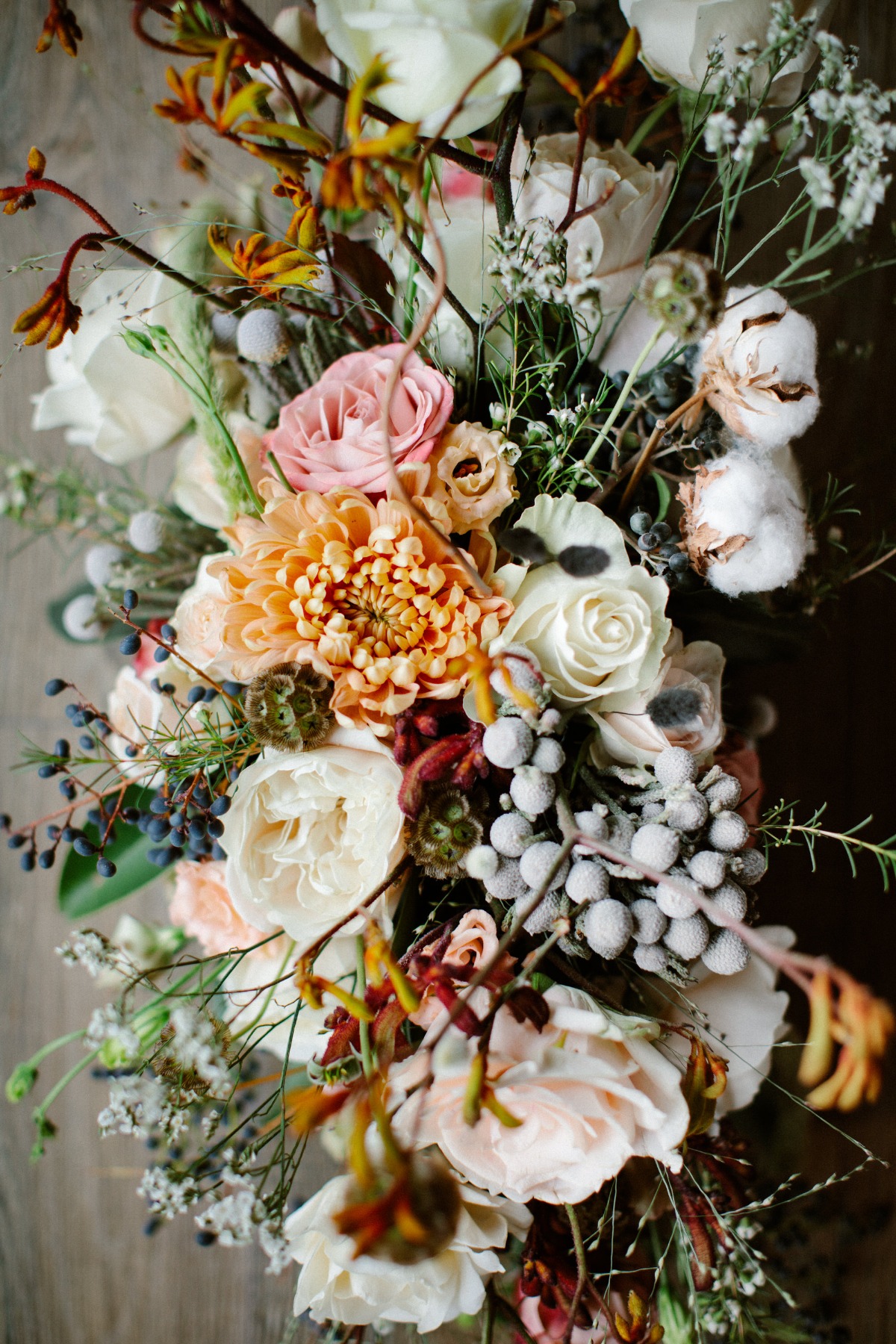 Elegant wedding bouquet with roses and various flowers close-up