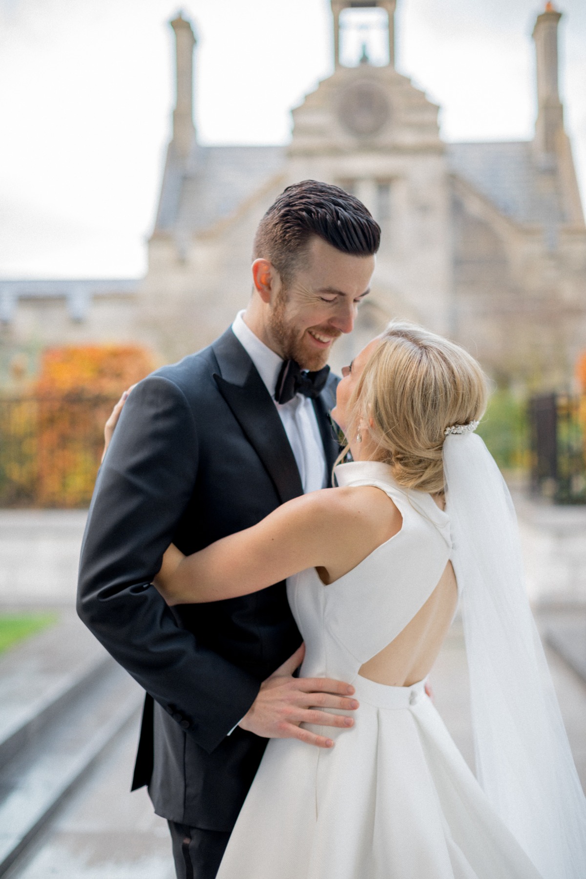 Happy bride and groom embracing on their wedding day