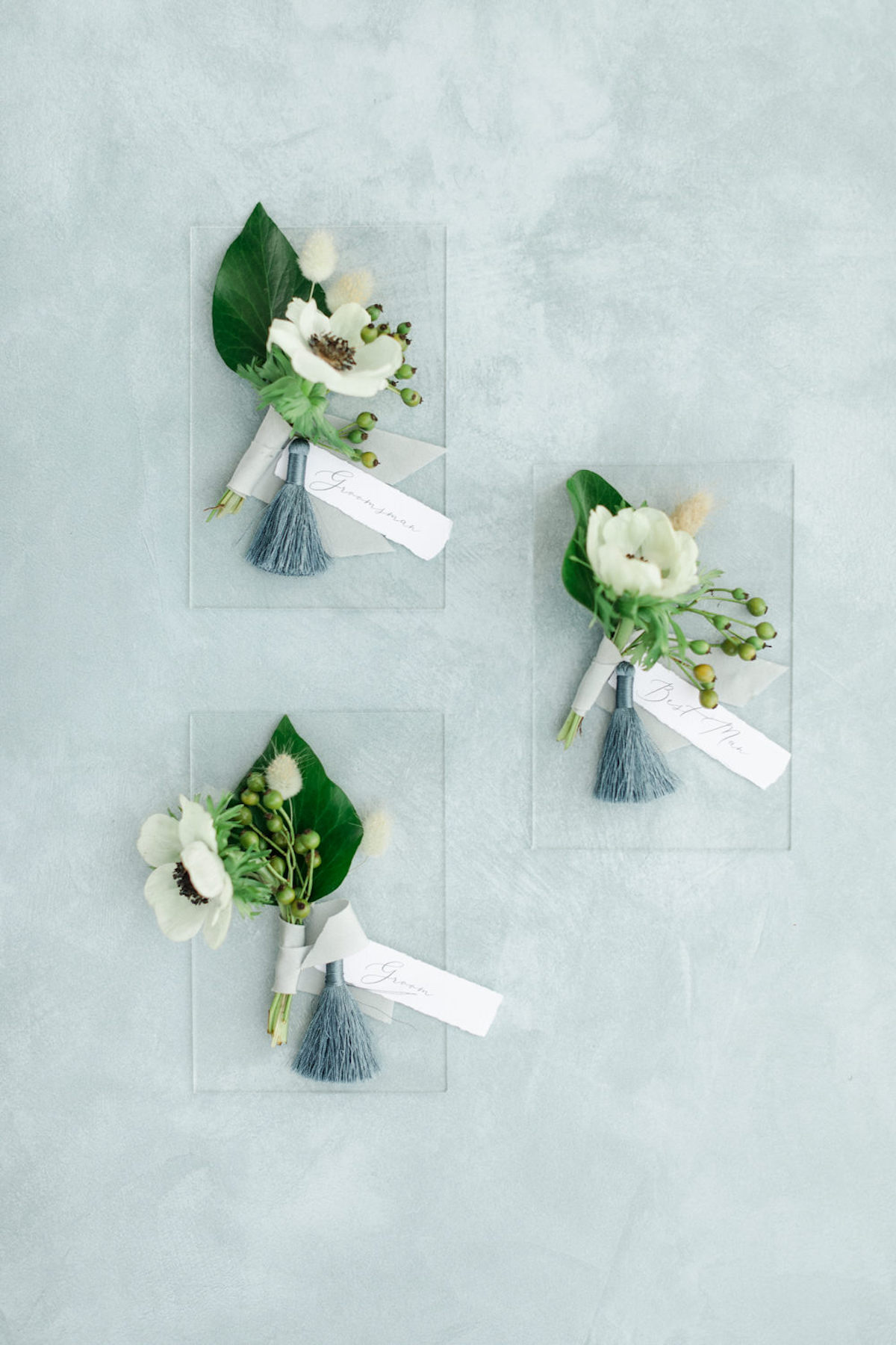 groom and groomsmen boutonniere flat lay ideas