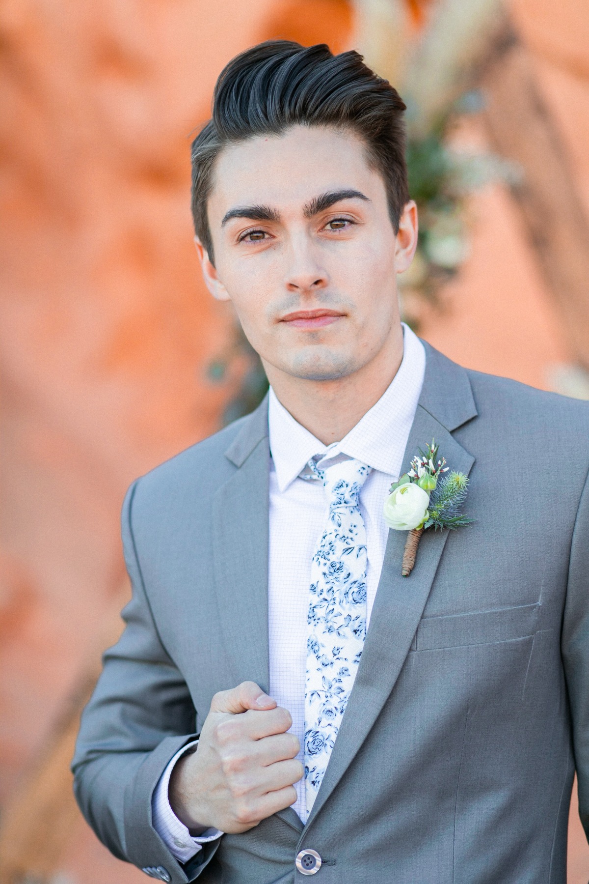 grey groom suit with floral tie