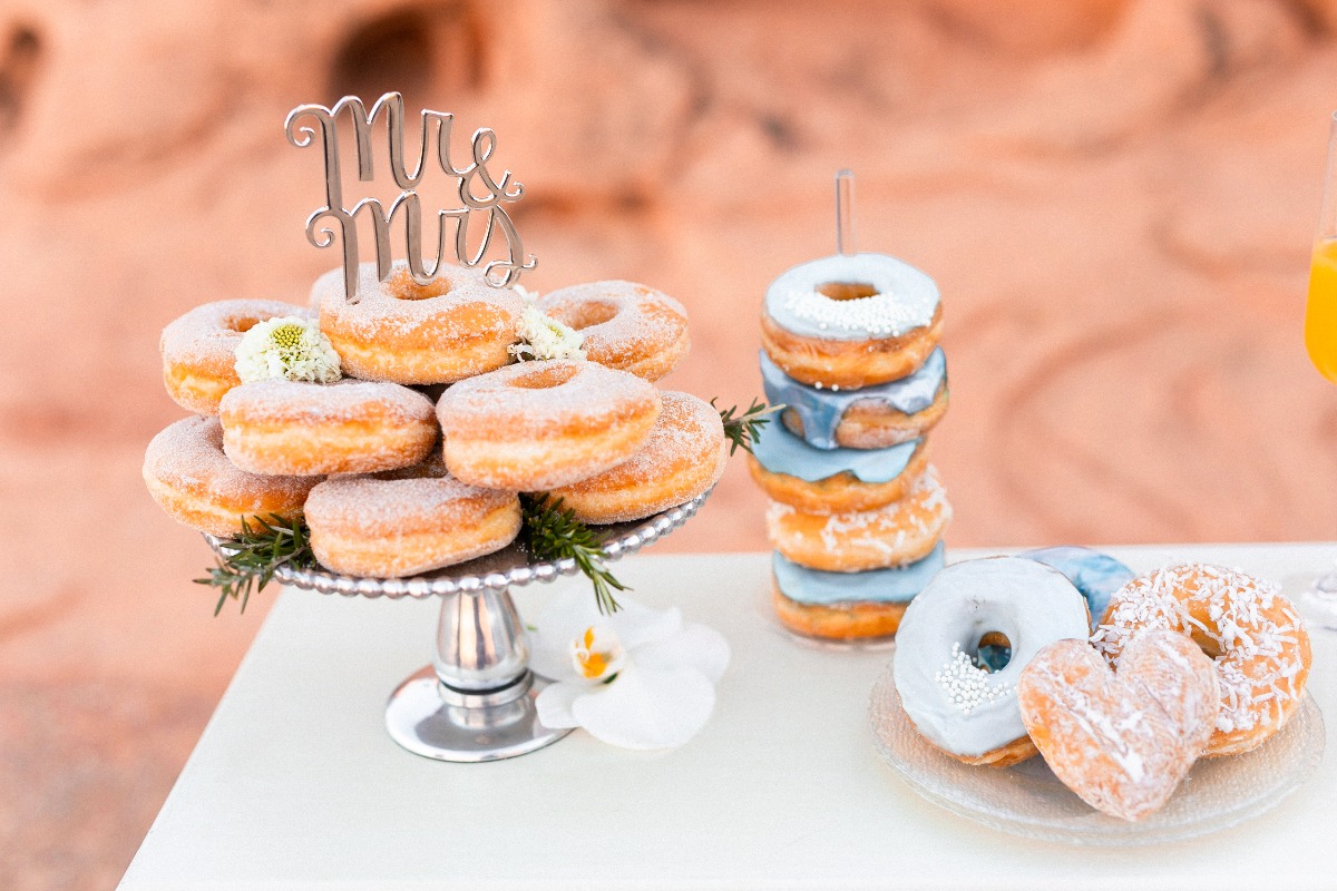 donuts with Mr. and Mrs. cake topper