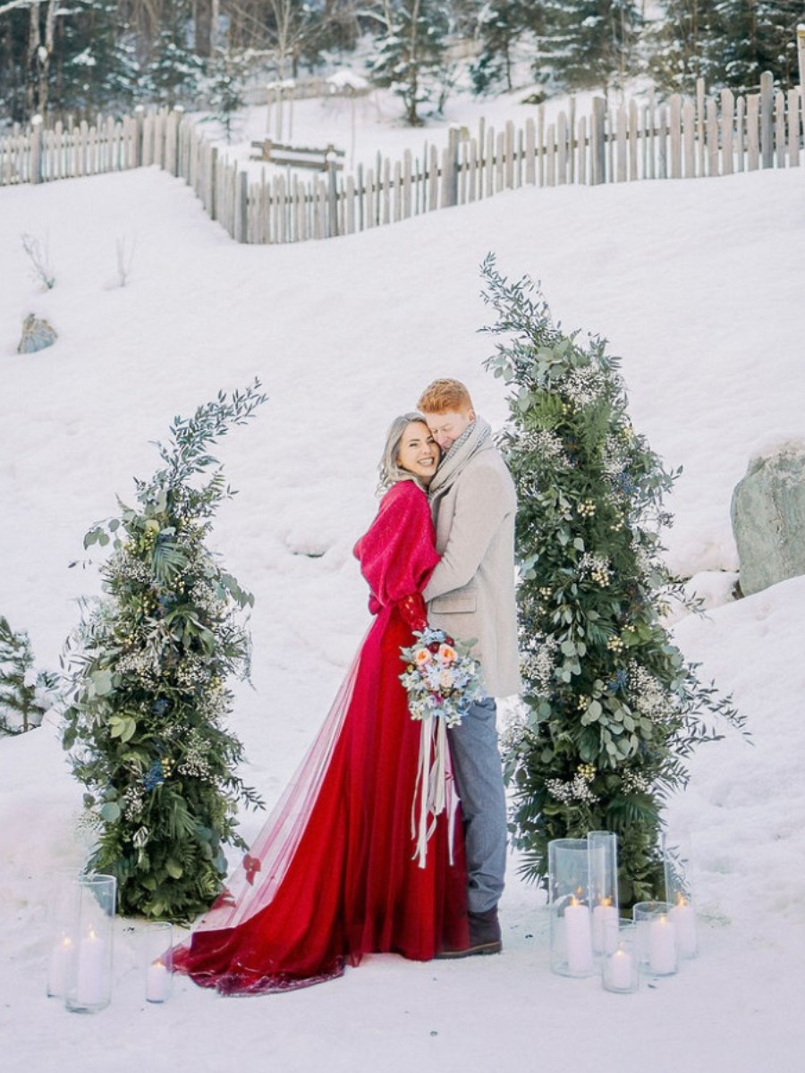 A Sky-Blue and Red Garnet Austrian Alps Snowy Elopement