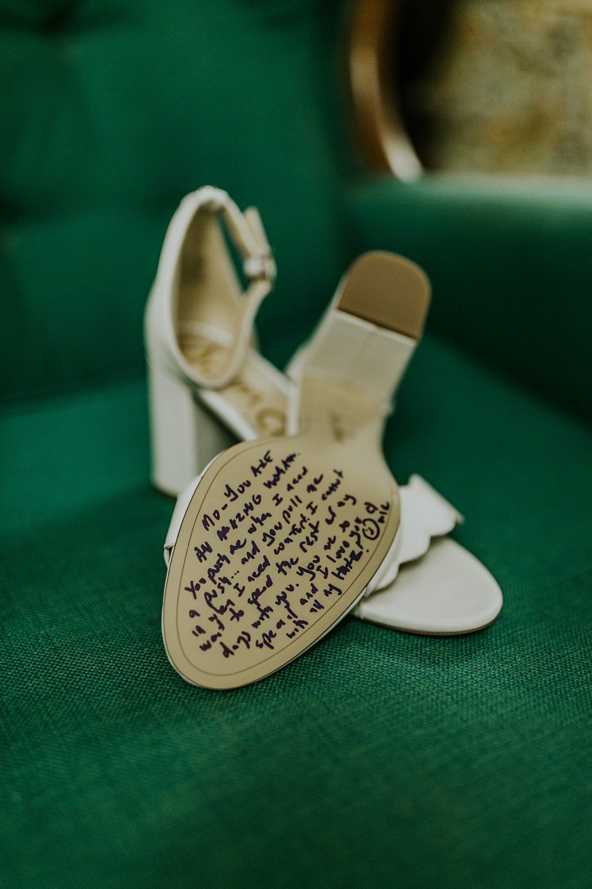 writing on bottom of wedding shoes