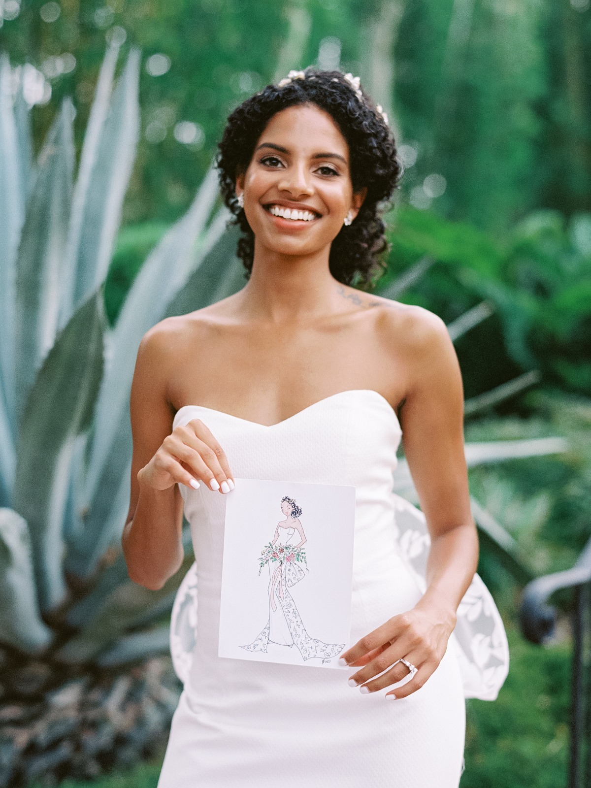 bride had a custom sketch drawn of her in her dress