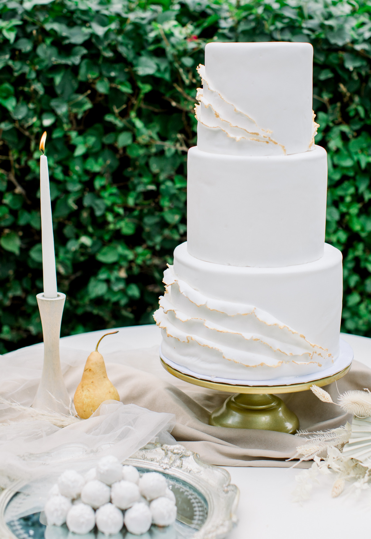 white wedding cake with burnt ruffle sides by Amour de Sucre