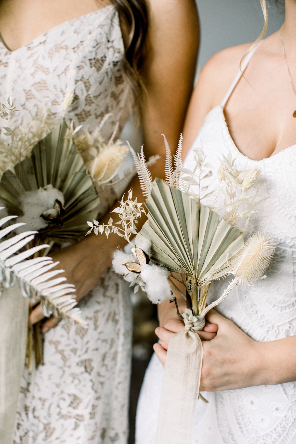 bridesmaids holding pampas grass wedding bouquets