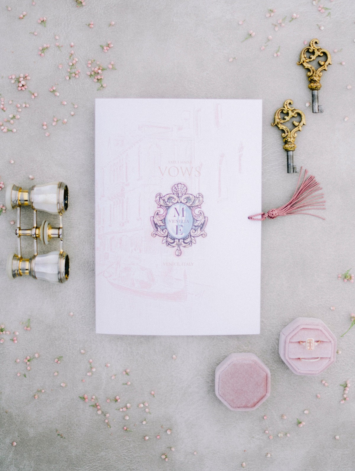 Elegant wedding invitation with antique keys and ring details