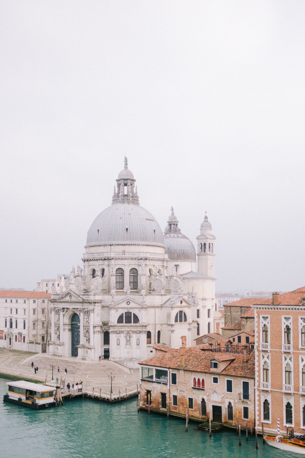 Venice Italy: stunning basilica overlooks the canal on a cloudy day