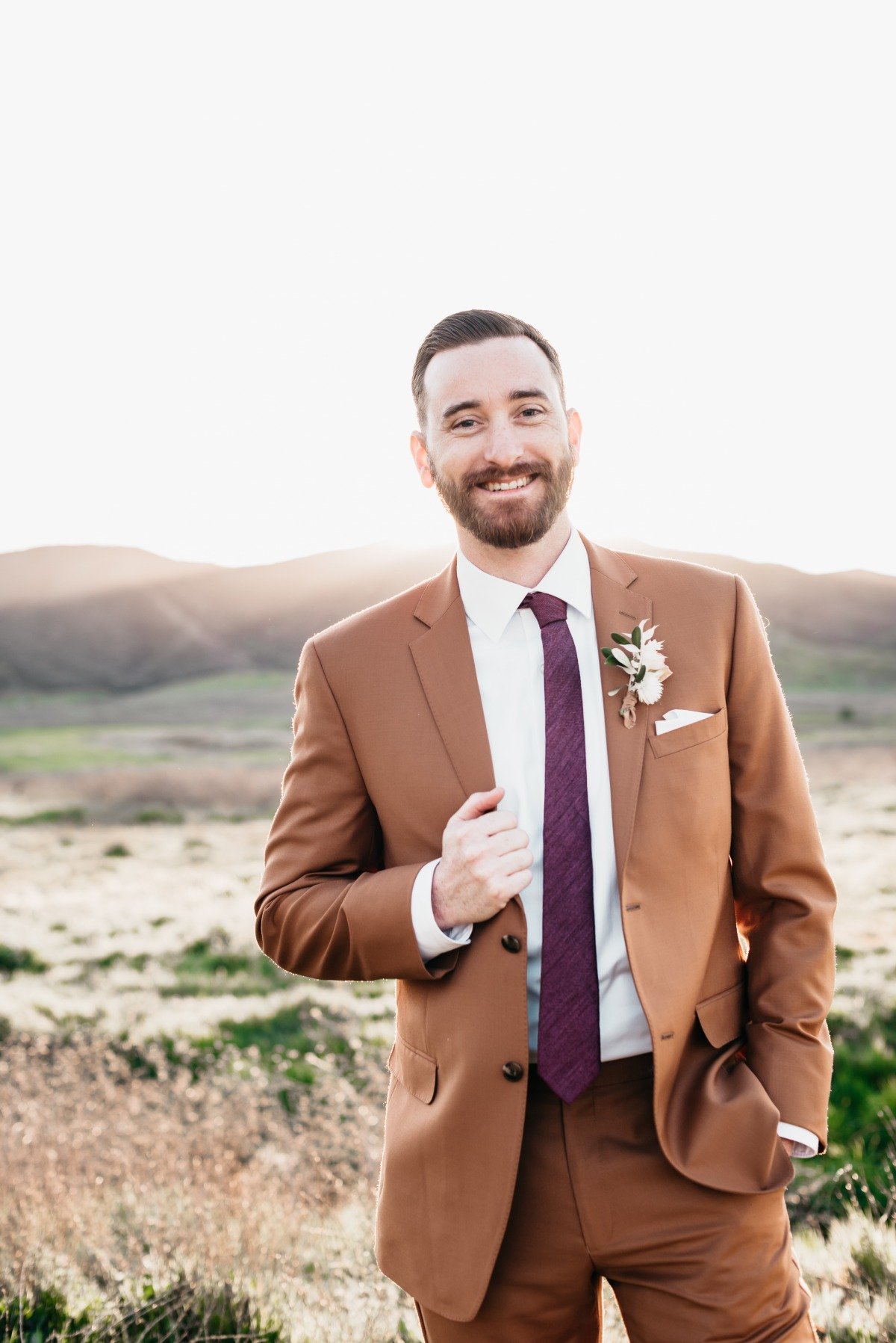groom in brown and burgundy suit ideas