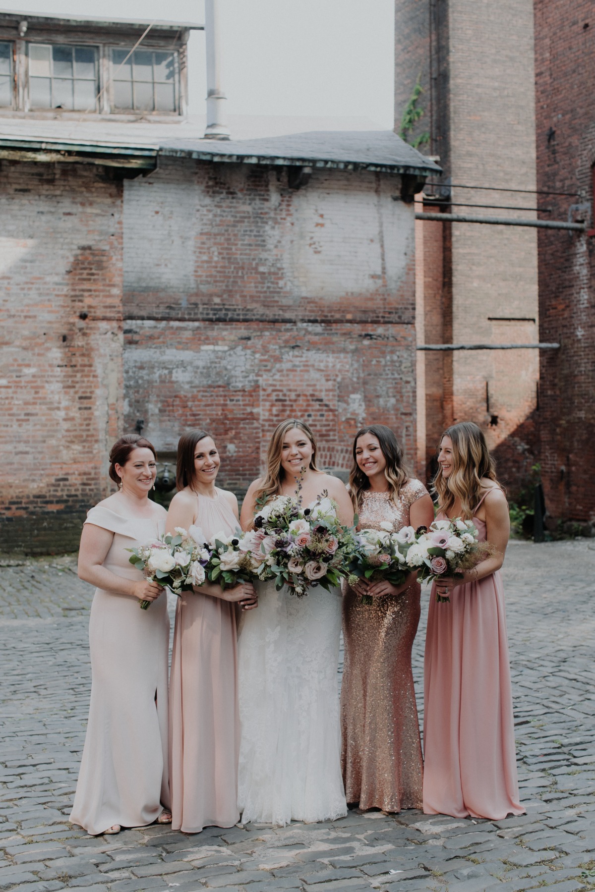 mismatched blush and rose gold sequined bridesmaid dresses