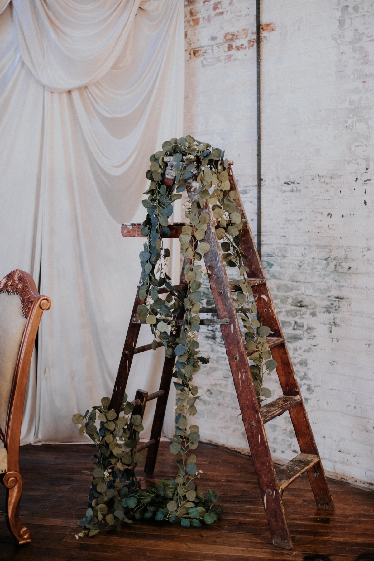 ladder decorated with eucalyptus