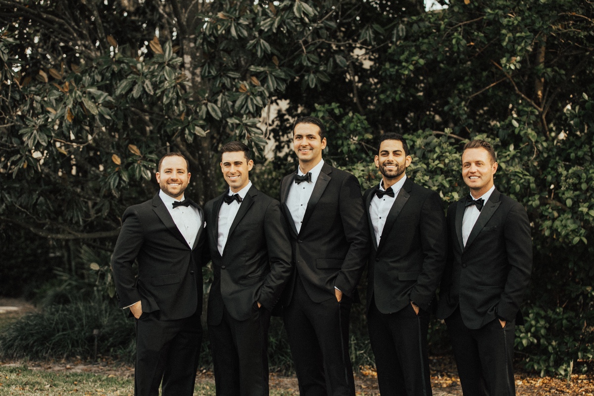 groomsmen in tuxedos