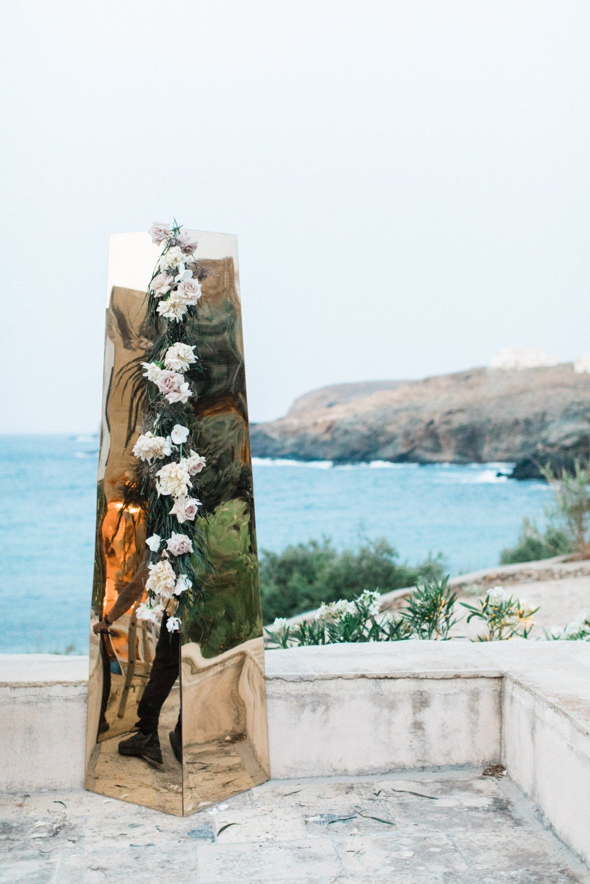 gold mirrored wedding backdrop at Mykonos elopement