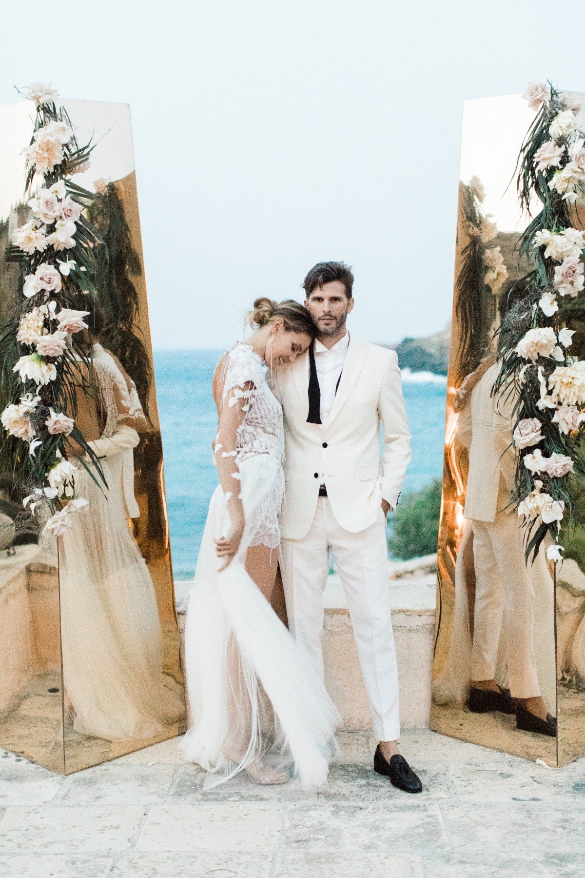 gold mirrored wedding backdrop at Mykonos elopement