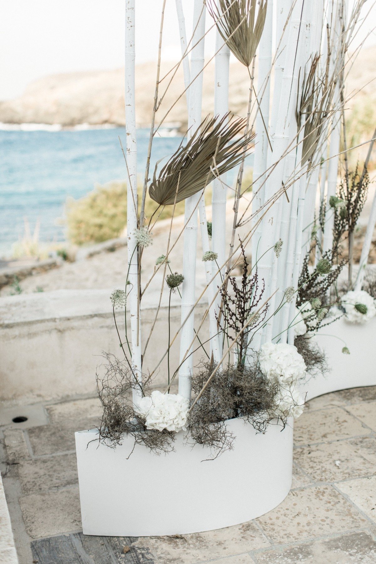 Greece wedding with bamboo wedding backdrop from Ceremonies by Rako
