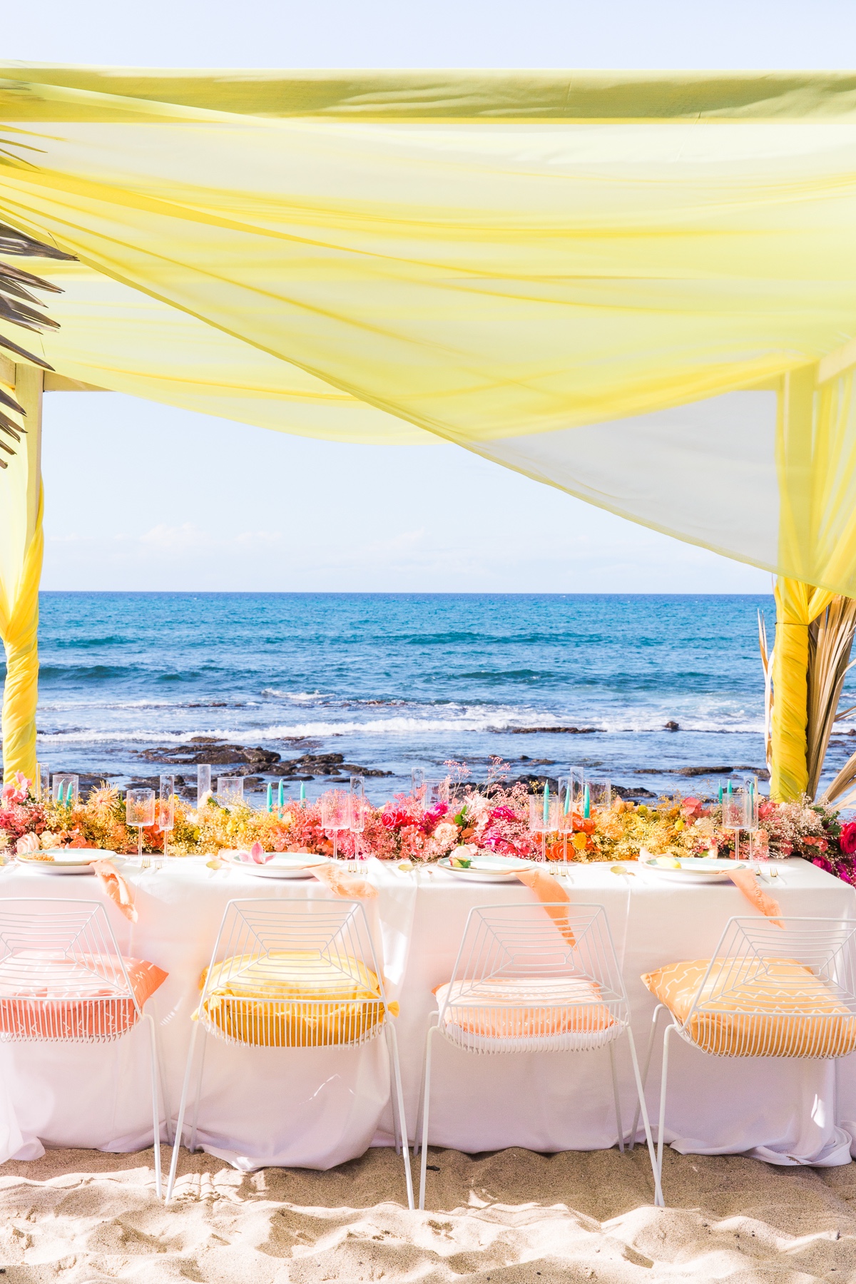 Rainbow wedding reception at the beach