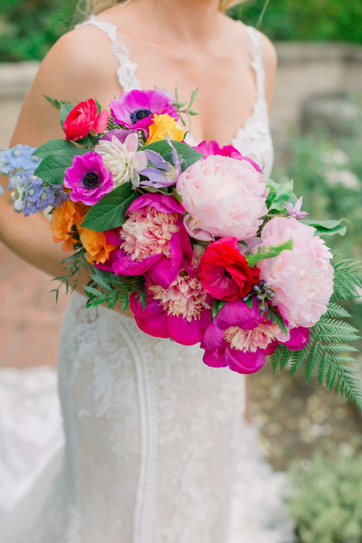 Pink peony wedding bouquet with magenta anemones