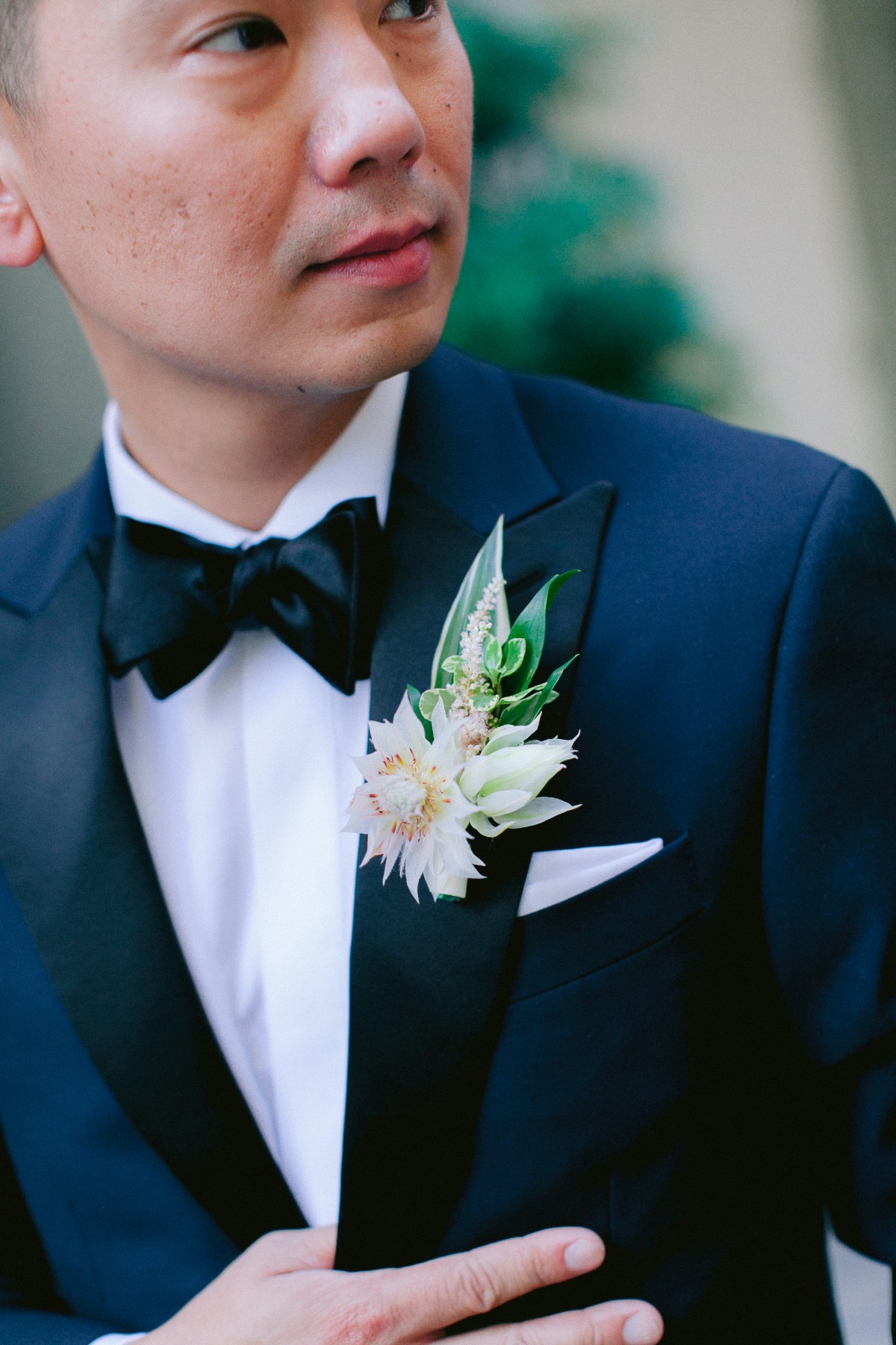 tropical boutonniÃ¨re for groom