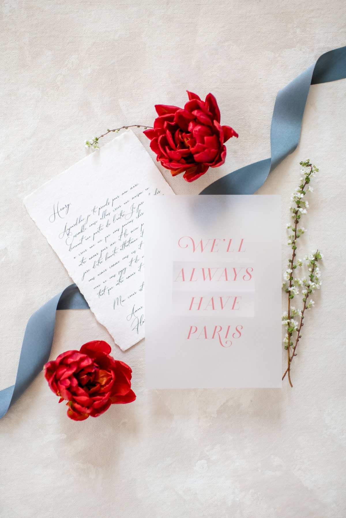 Romantic Parisian scene with flowers and a handwritten note