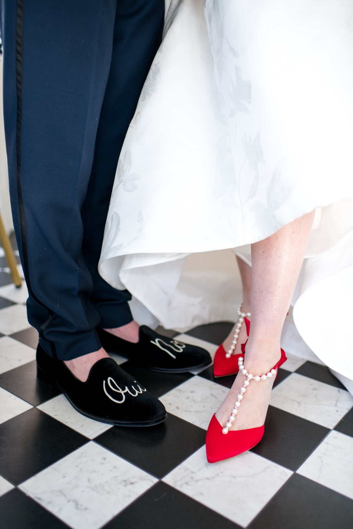 Wedding day feet: bride in red heels and groom in Oui shoes