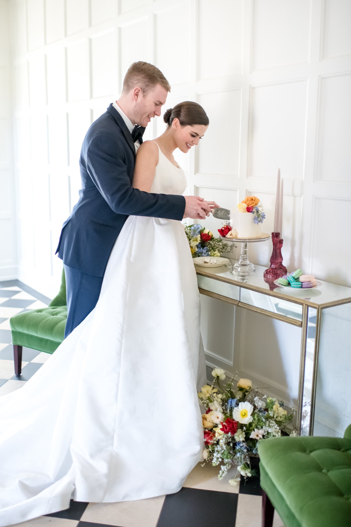 bride and groom cutting wedding cake at elopement