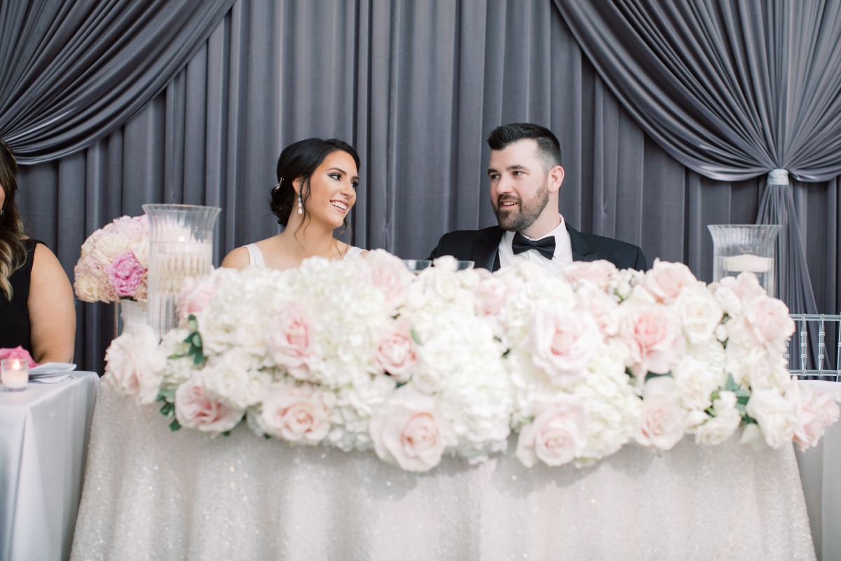 sweetheart table filled with florals