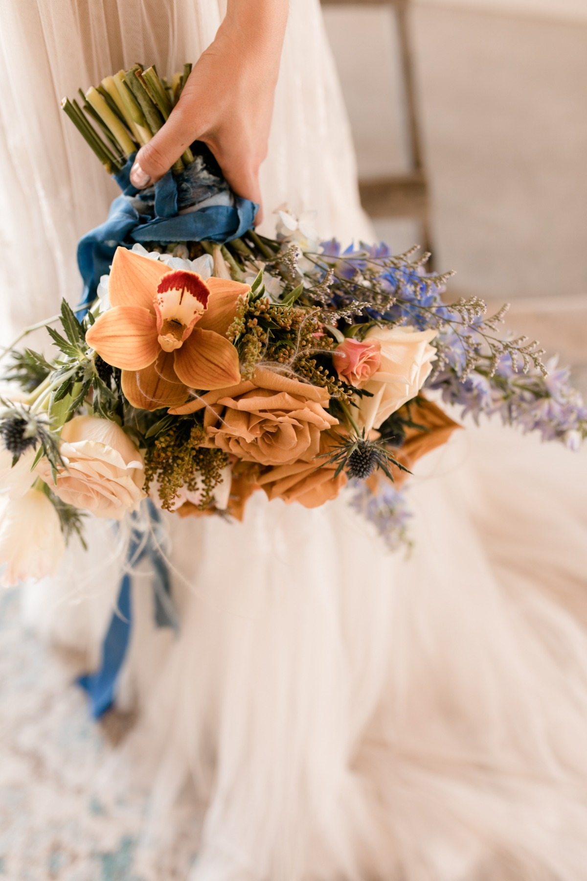 whimsical blue, orange and white wedding bouquet by Flourish & Knot