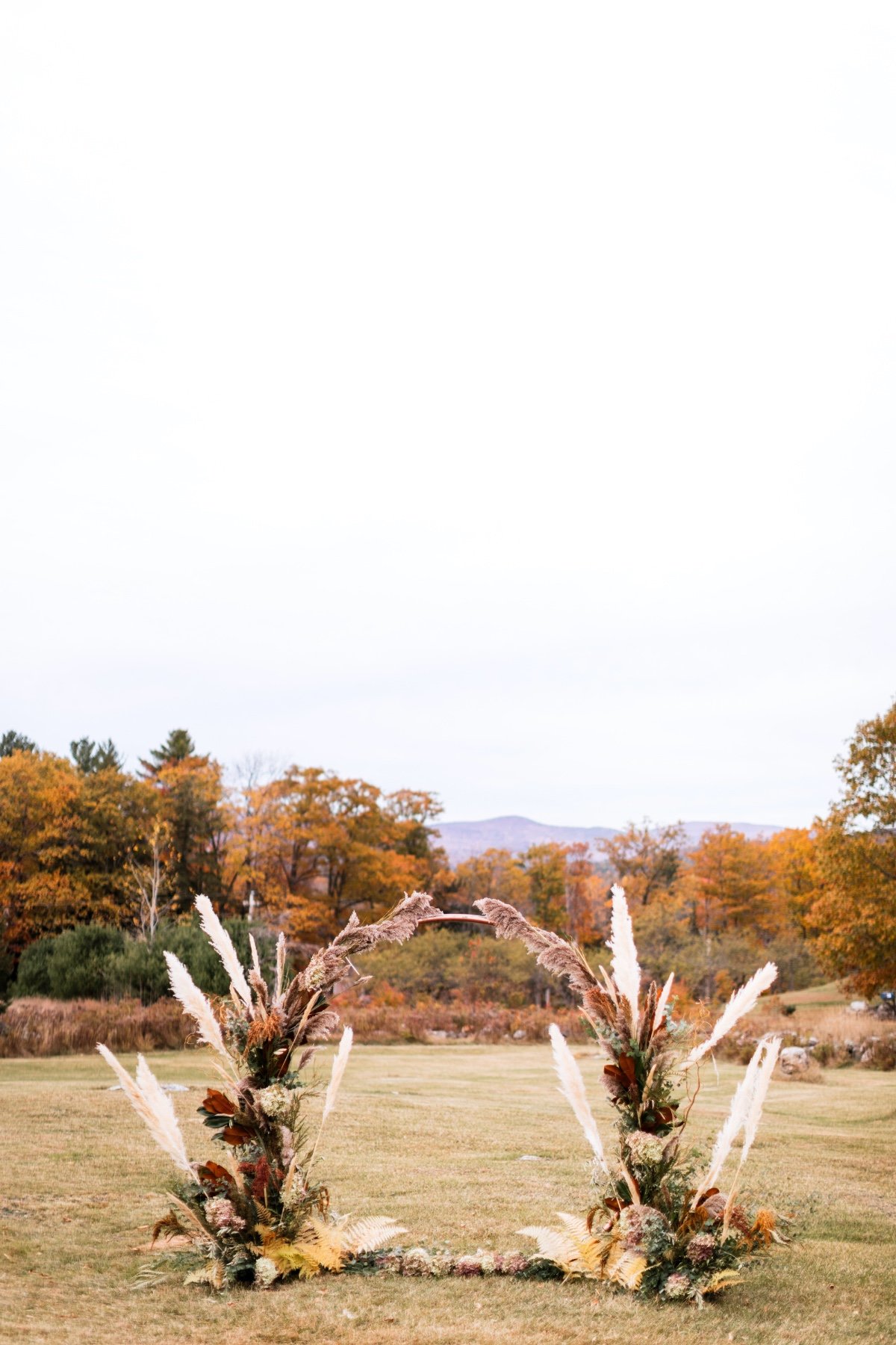 Fall wedding backdrop made with pampas grass