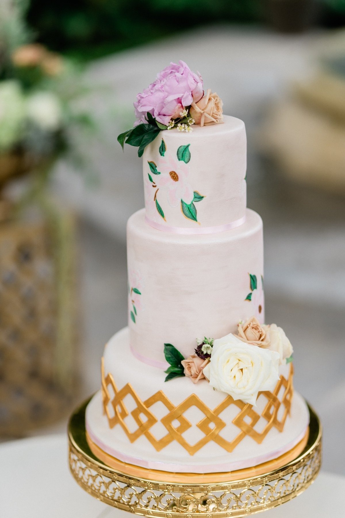 gold and floral wedding cake