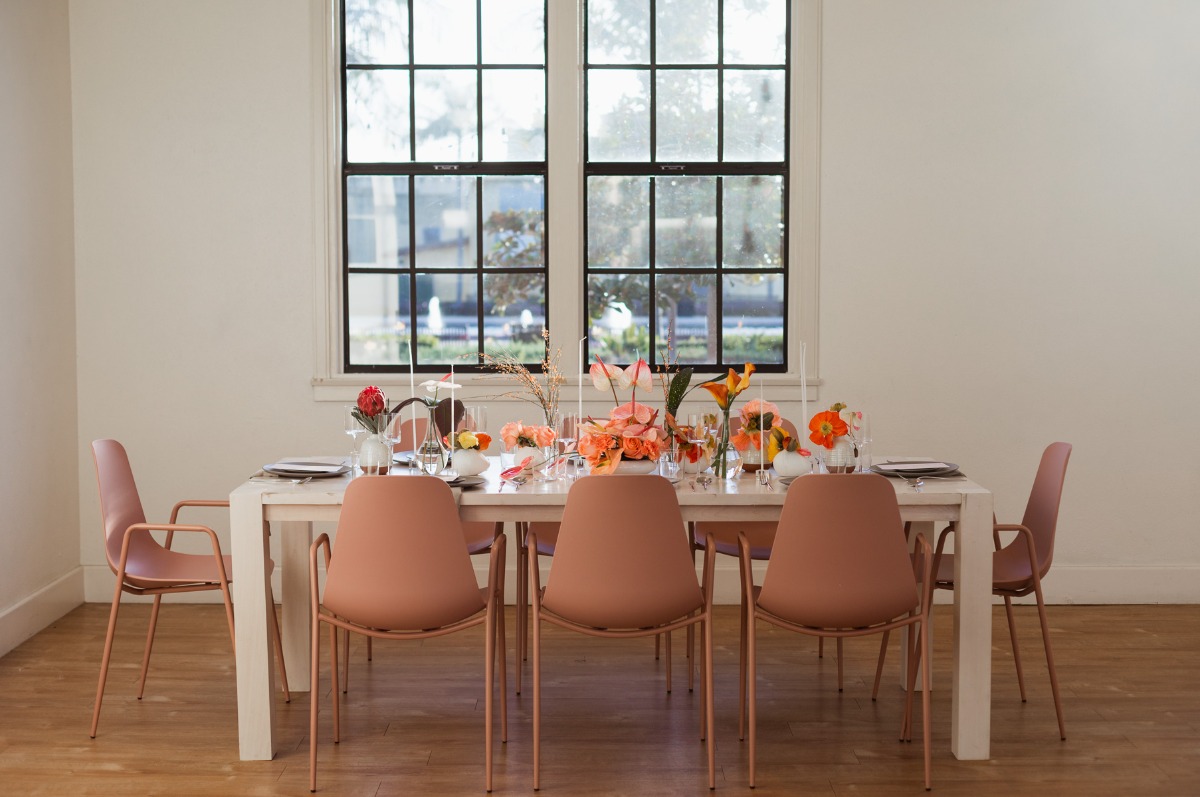 Elegant dining table setup with floral centerpiece decor