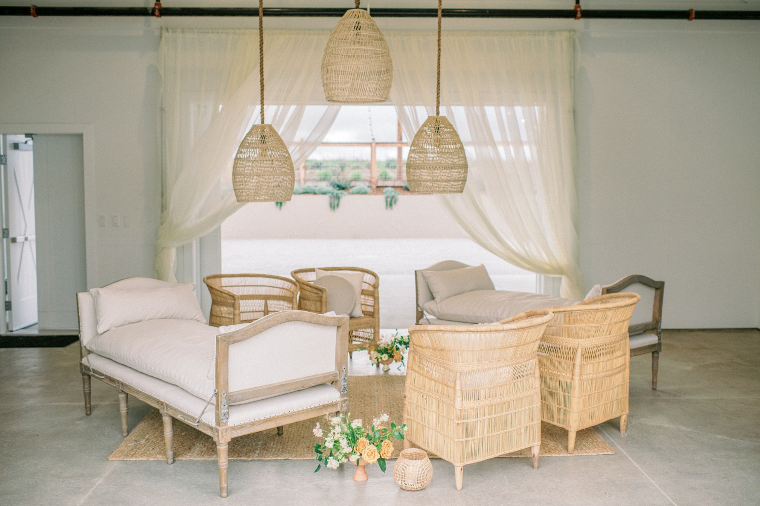 boho chic lounge area with rentals from Avenue Twelve Rentals
