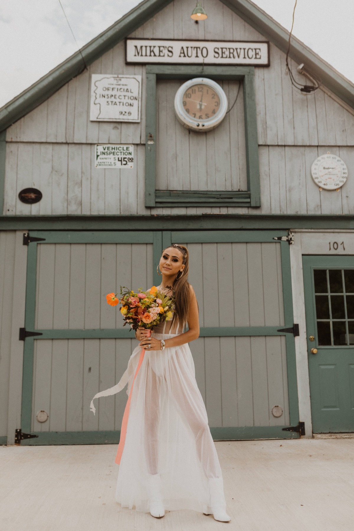 bright and colorful wedding bouquet with white boots