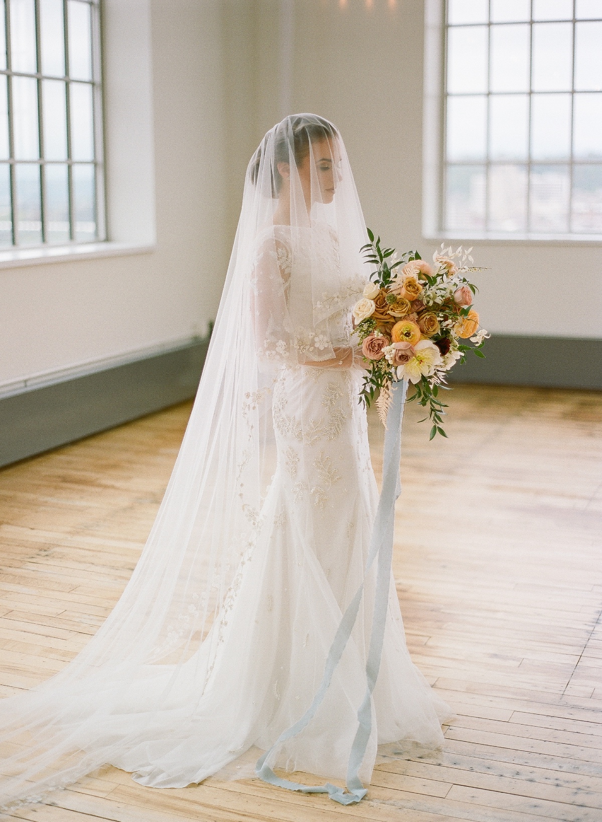 romantic bridal portrait pose idea with veil