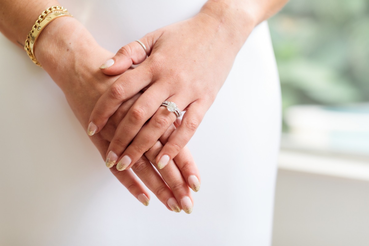 Cartier love bracelet paired gold and nude wedding nail ideas
