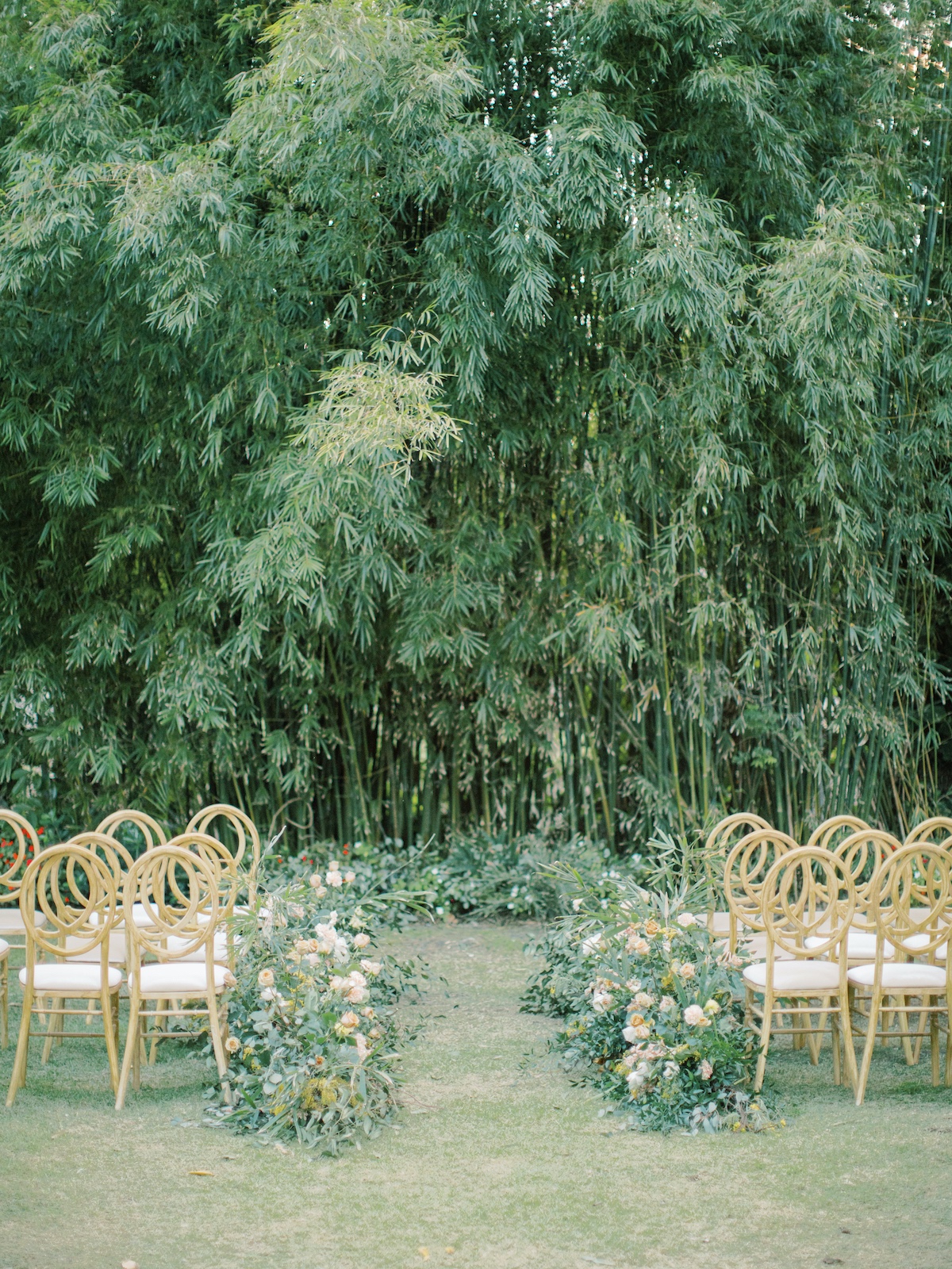 wedding ceremony in front of a forest of bamboo