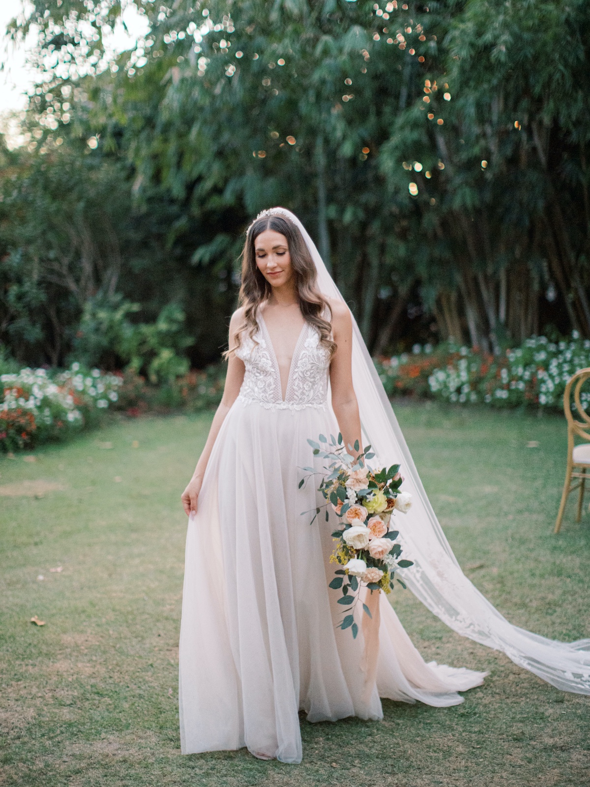 low front wedding gown with cathedral wedding veil