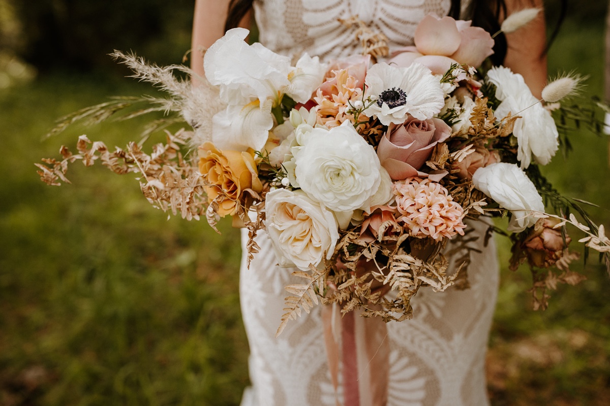 blush, white and yellow wedding bouquet designed by Freckled Fleurs