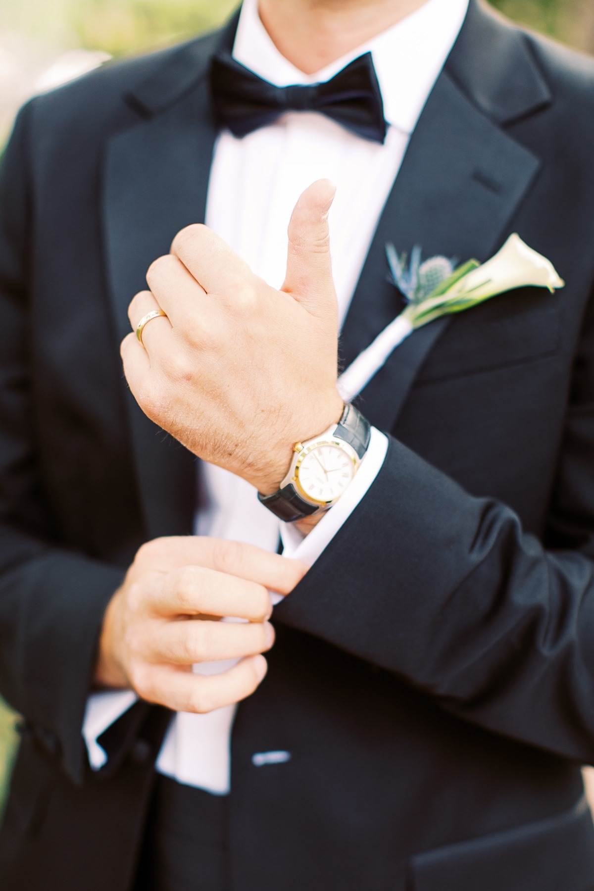 black tux with white boutonniÃ¨re
