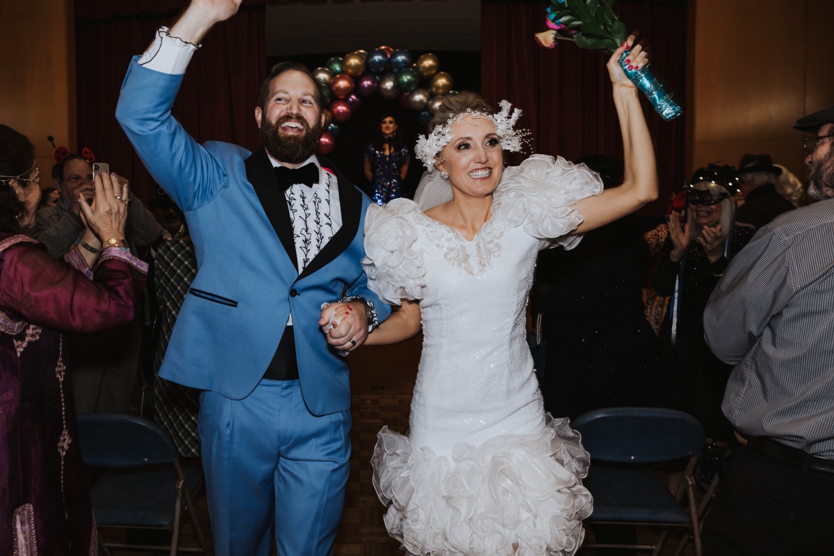 Yay! We're married this 80's inspired costume wedding