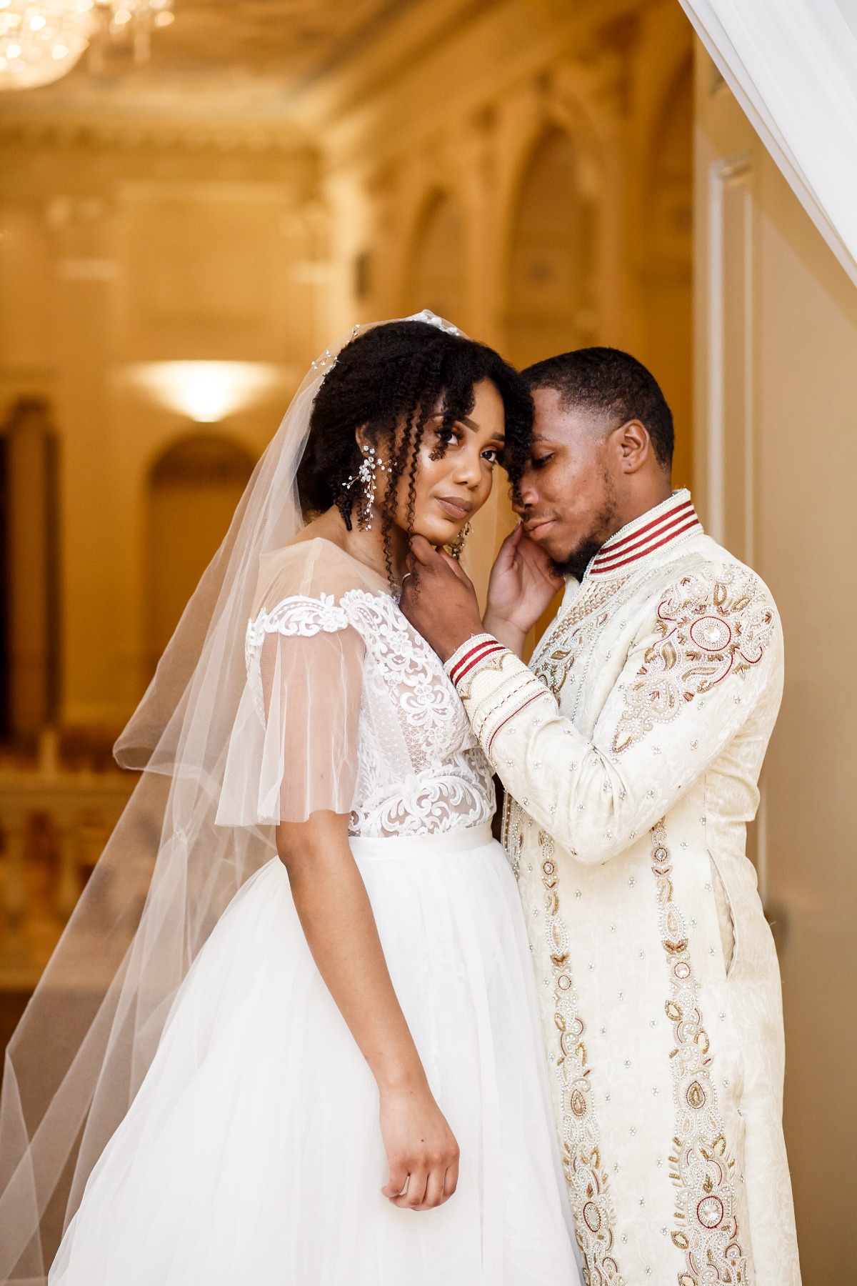 Bride and groom embracing on their elegant wedding day