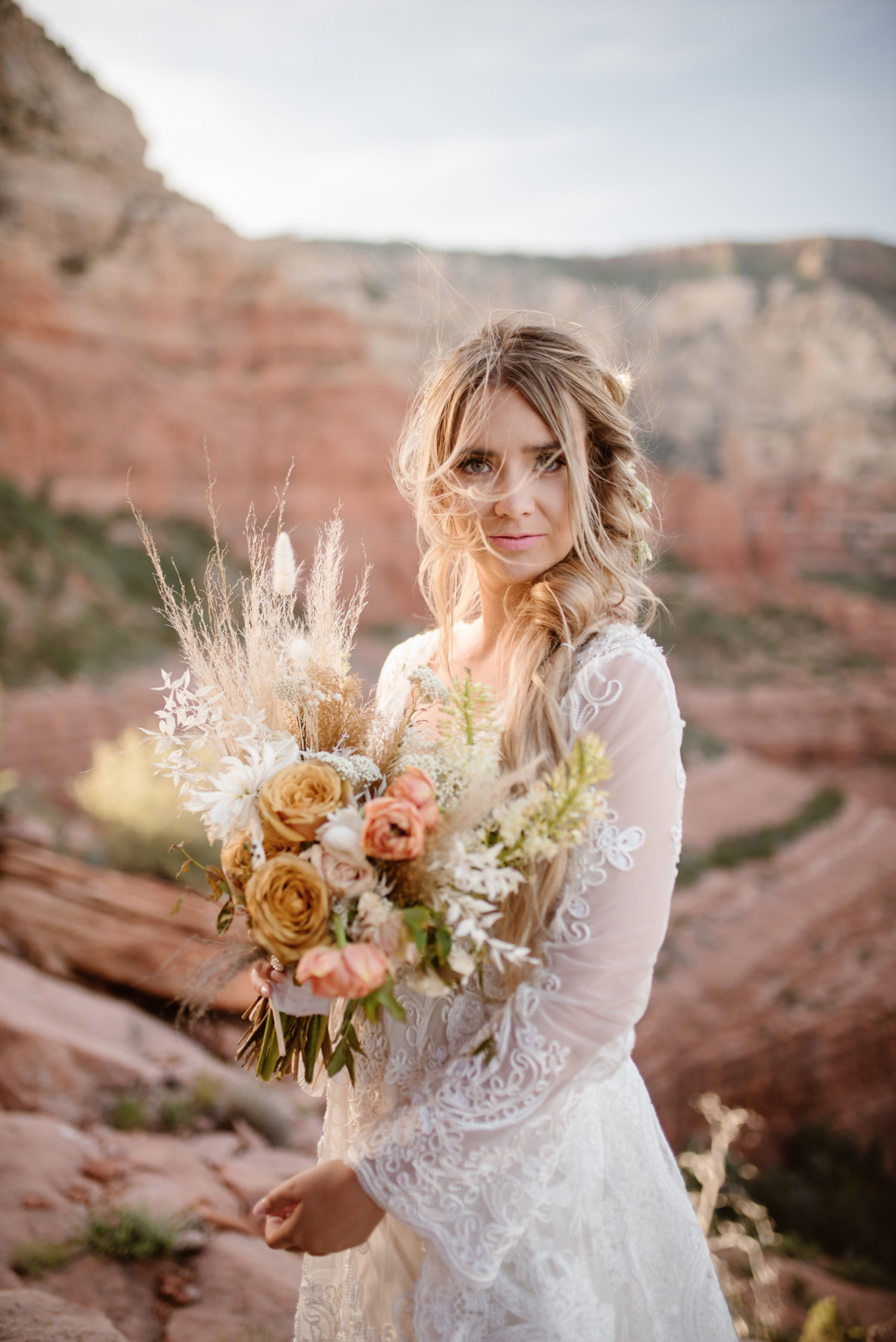 bride with dried floral bouquet