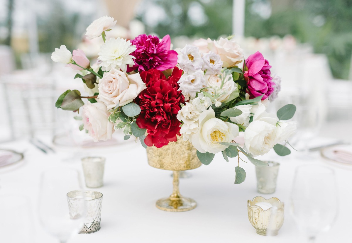 blush and white wedding centerpiece in a gold vessel designed by Petaloso