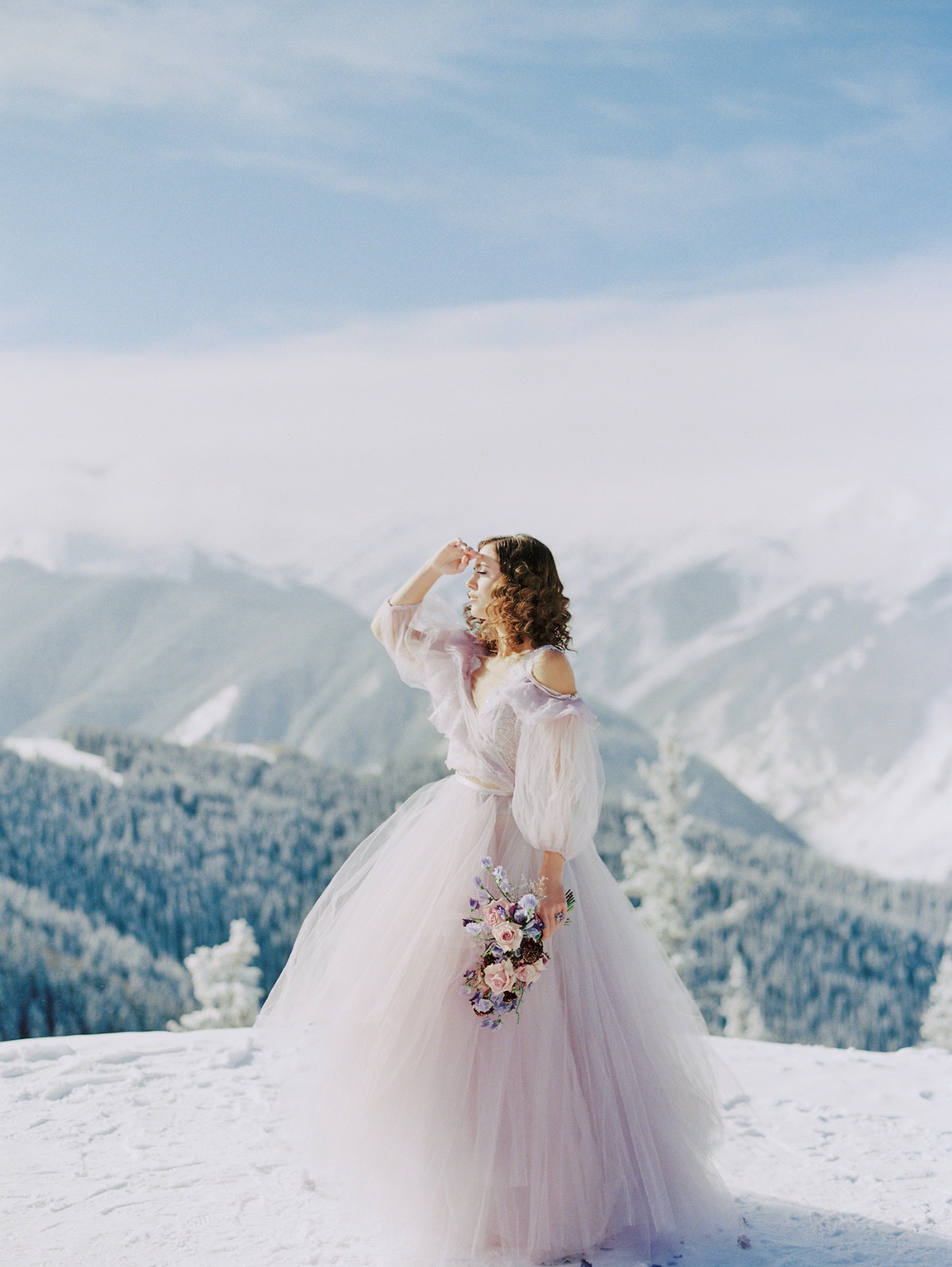pastel colored Claire LaFaye wedding gown