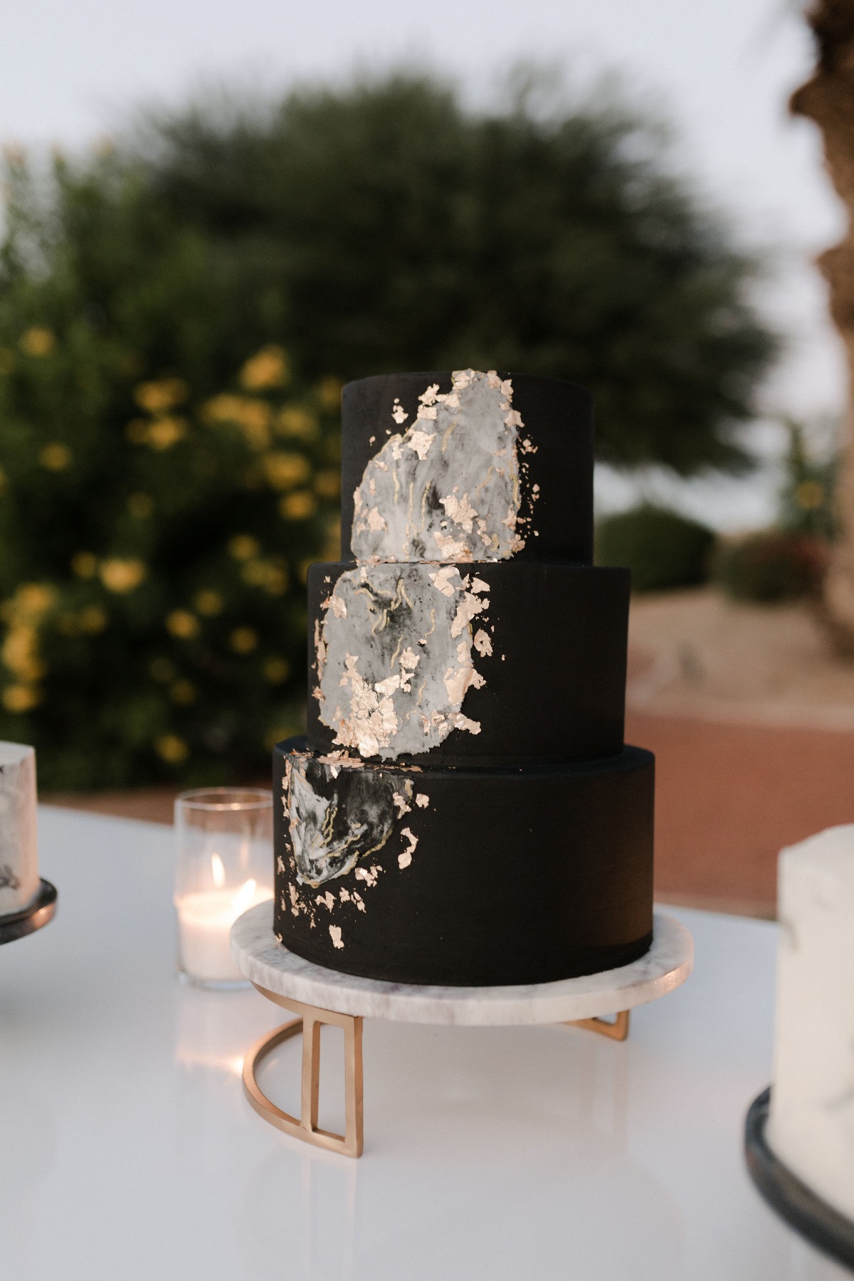black and white modern cake on marble cake stand