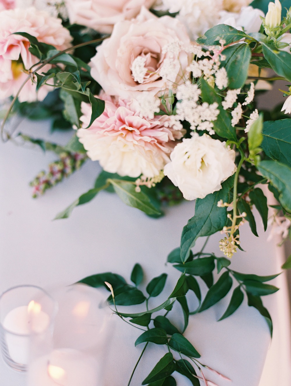 welcome wedding table with florals